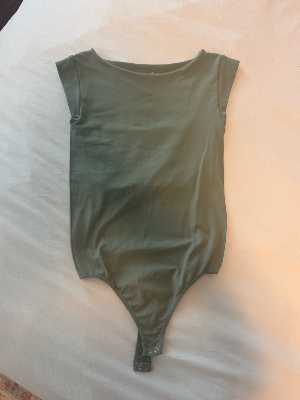 Green One-Piece Bodysuit